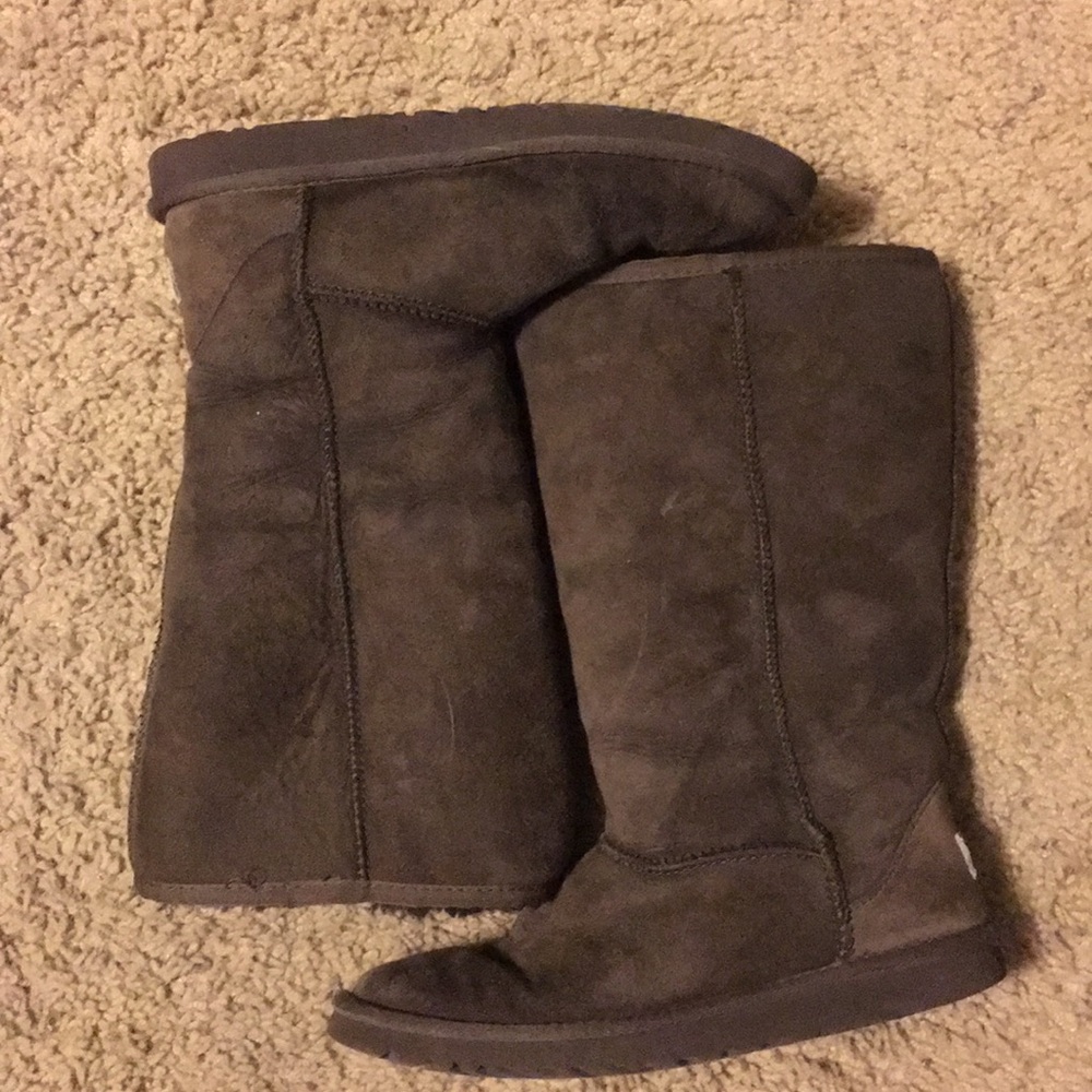Brown Uggs slightly worn.